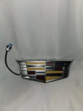 23182046 Cadillac 2015-2020 Escalade Rear Liftgate Outside Release Handle Emblem