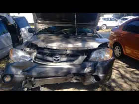 129-52142r Mazda Passenger Door Handle Exterior Rear Fits 01-02 05-06 Tribute 1077961