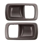 Trq Driver & Passenger Side Interior Door Handle Bezel Set Brown New. Price: $32.90.
