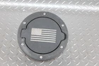 07-18 Wrangler Aftermarket Black American Flag Emblem Fuel Filler Door Assembly Used. Price: $114.99.