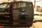 05-15 Tacoma 4.0L Black Driver Left Rear Door Assembly Used. Price: $597.28.